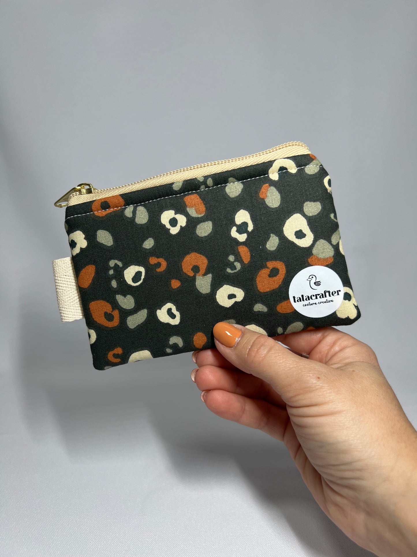 Monedero manchitas